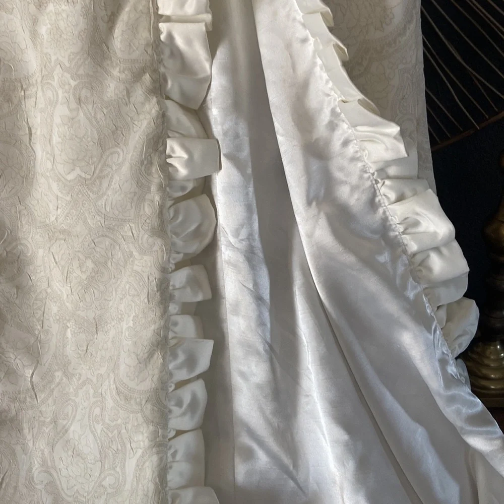 Custom made ivory tone on tone sleeveless dress with satin ruffle and bow. - Picture 5 of 7